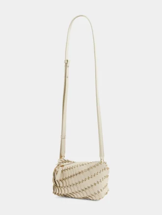 Kremowa skórzana torebka typu crossbody marki Paco