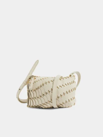 Kremowa skórzana torebka typu crossbody marki Paco